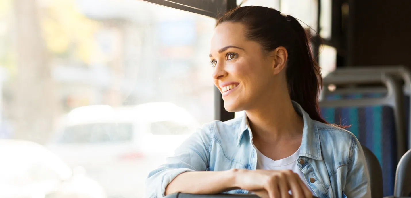 Happy passenger on a bus